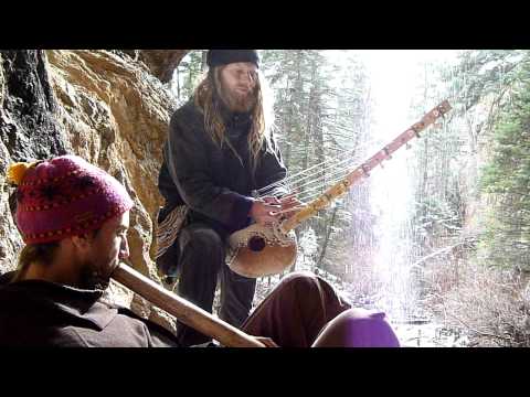 Eric_Mandala_playing_N_goni_in_Taos_by_the_waterfall_with_Will_i_am_on_Didgeridoo